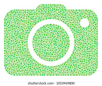 Photo Camera mosaic of round dots in different sizes and green color tones. Dots are organized into photo camera vector composition. Ecology vector illustration.