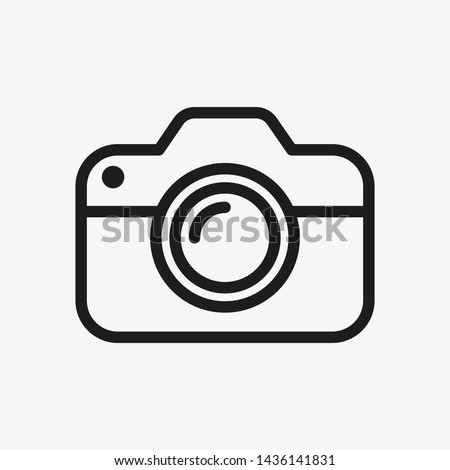 Photo camera outline vector icon.