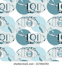 Photo camera. Retro seamless background. Hand drawn pattern.