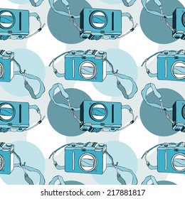 Photo camera. Retro seamless background. Hand drawn pattern.