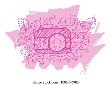 Photo camera with rose flower