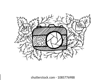Photo camera with rose flower