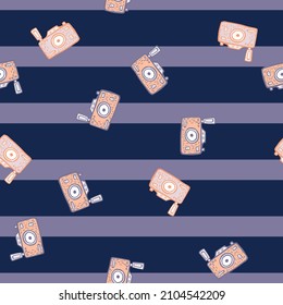 Photo camera seamless pattern. Cute vintage cameras background. Repeated texture in doodle style for fabric, wrapping paper, wallpaper, tissue. Vector illustration.