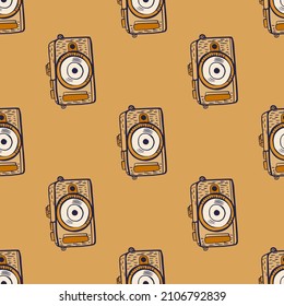 Photo camera seamless pattern. Cute vintage cameras background. Repeated texture in doodle style for fabric, wrapping paper, wallpaper, tissue. Vector illustration.