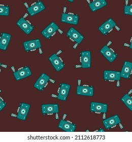 Cámara fotográfica con un patrón impecable. Borde de las cámaras antiguas. Textura repetida en forma de doodle para tela, papel envolvente, papel pintado, tejido. Ilustración vectorial.