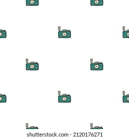 Photo camera seamless pattern. Cute vintage cameras background. Repeated texture in doodle style for fabric, wrapping paper, wallpaper, tissue. Vector illustration.