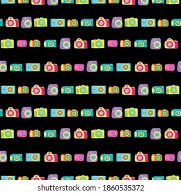 Photo camera seamless pattern. Drawn retro colorful films. Bright and colorful designs and prints for teens and children. For fabrics, textiles, paper.