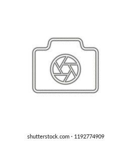 Photo camera with shutter, linear symbol with thin outline, simple icon. Dotted outline silhouette with shadow on white background