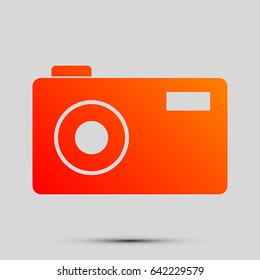 Photo camera sign. Vector. Orange, red-yellow icon with shadow on gray background.