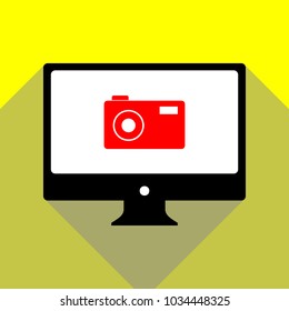 Photo camera sign. Vector. Red icon on white monitor of black all-in-one desktop computer with two shadows at yellow background.