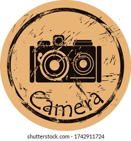 Photo camera silhouette icon vector round shabby emblem design, old retro style. Old camera logo mail stamp on craft paper. Film camera shape vintage grunge sign. Icon for web design. Flat design.