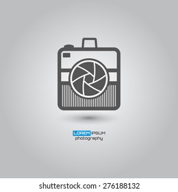 Photo camera, simple conceptual logo design. Logo template. Corporate icon. Vector illustration.
