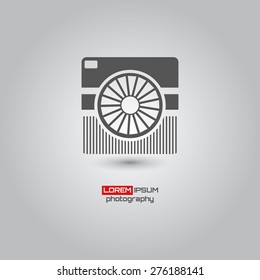 Photo camera, simple conceptual logo design. Logo template. Corporate icon. Vector illustration.