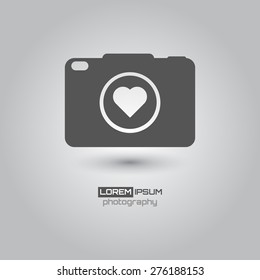 Photo camera, simple conceptual logo design. Logo template. Corporate icon. Vector illustration.