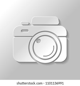Photo camera, simple icon. Paper style with shadow on gray background