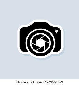 Photo camera sticker. Camera with lens icon. Photography concept. Vector on isolated background. EPS 10.
