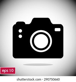 Photo camera symbol. DSLR camera sign icon. Digital camera. Flat design style. 