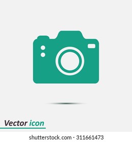 Photo camera symbol. DSLR camera sign icon. Digital camera. Flat design style. 