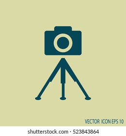 photo camera. tripod.