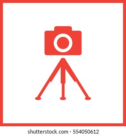 photo camera. tripod.