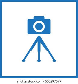 photo camera. tripod.