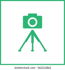 photo camera. tripod.