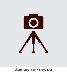 photo camera. tripod.