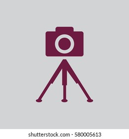 photo camera. tripod.