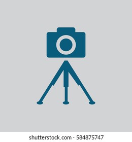 photo camera. tripod.