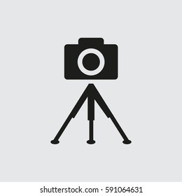 photo camera. tripod.