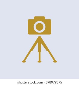 photo camera. tripod.