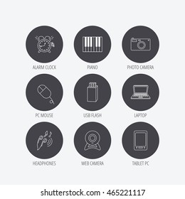Photo camera, USB flash and notebook laptop icons. PC mouse, alarm clock and web camera linear signs. Tablet PC and music headphones icons. Linear icons in circle buttons. Flat web symbols. Vector