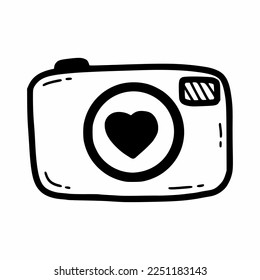 Fotokamera. Vektordoodle-Illustration. Symbol. Handgezeichnete Skizze.