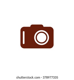 Photo camera. Vector icon brown
