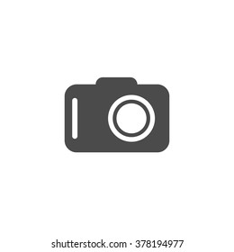 Photo camera. Vector icon grey