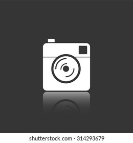 photo camera vector icon with mirror reflection