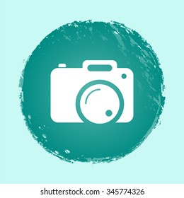 photo camera vector icon on round button