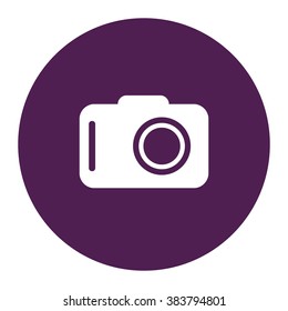 Photo camera. Vector icon purple
