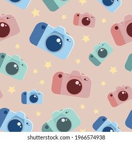 Photo camera vector template. Seamless background with hand drawn cameras. Abstract seamless background. Multi-colored cameras with stars. Turquoise, blue and pink are a great combination. Camera icon