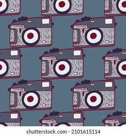 Photo camera vintage seamless pattern. Retro photo cameras design. Repeated texture in doodle style for fabric, wrapping paper, wallpaper, tissue. Vector illustration.