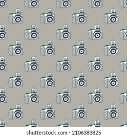 Photo camera vintage seamless pattern. Retro photo cameras design. Repeated texture in doodle style for fabric, wrapping paper, wallpaper, tissue. Vector illustration.