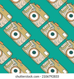 Patrón transparente de cámara fotográfica. Diseño de cámaras fotográficas retro. Textura repetida en forma de doodle para tela, papel envolvente, papel pintado, tejido. Ilustración vectorial.