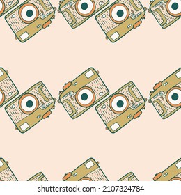 Patrón transparente de cámara fotográfica. Diseño de cámaras fotográficas retro. Textura repetida en forma de doodle para tela, papel envolvente, papel pintado, tejido. Ilustración vectorial.