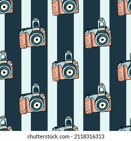 Photo camera vintage seamless pattern. Retro photo cameras design. Repeated texture in doodle style for fabric, wrapping paper, wallpaper, tissue. Vector illustration.