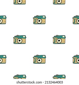 Photo camera vintage seamless pattern. Retro photo cameras design. Repeated texture in doodle style for fabric, wrapping paper, wallpaper, tissue. Vector illustration.