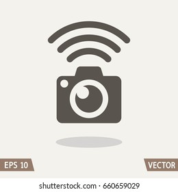 Photo camera Wi-Fi connection icon. Vector Illustration.