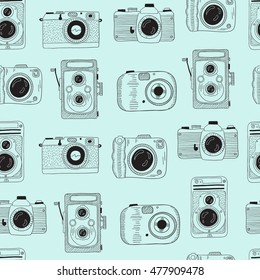 Photo cameras pattern. Vector hand drawn illustration.