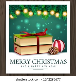 Photo with Christmas books and merry Christmas greetings