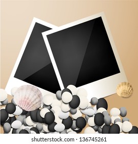 Photo frame background with stones and seashells .
