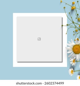 Photo frame decorated with green leaves and flowers on pastel background. Empty space for text. Mock up with copy space. Social media template.